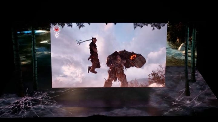 Kevin with the dev team and the Best of E3 awards wall